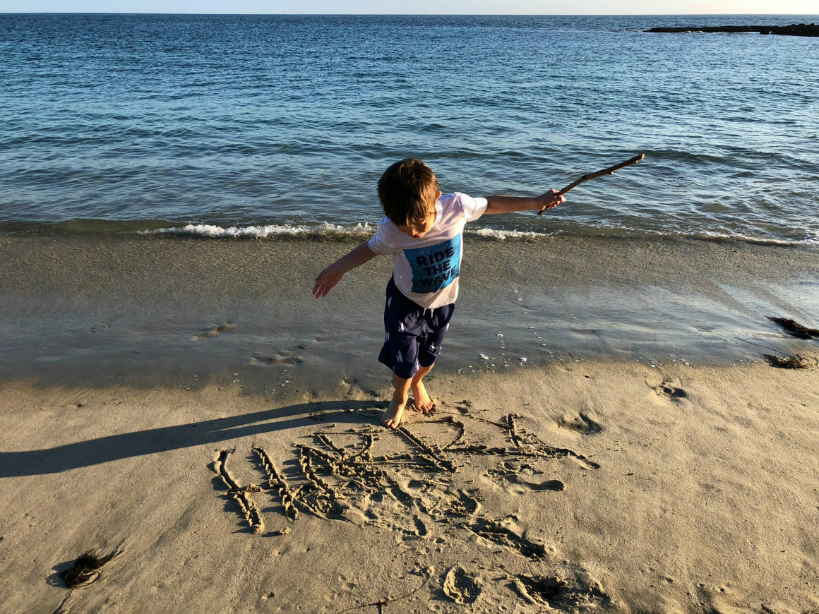 playing on the beach at Montage Laguna Beach - well traveled kids